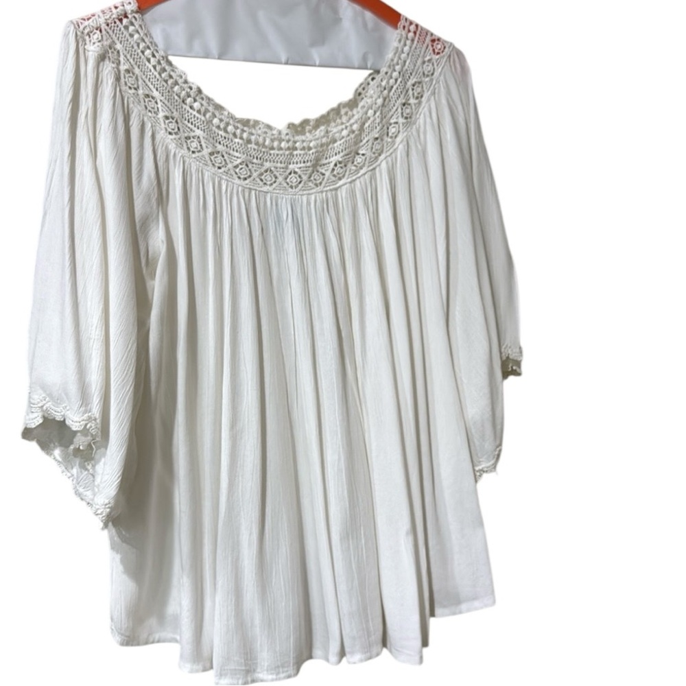 Anthropologie size M top with 3/4 sleeve worn twice with crocheted lace neck
